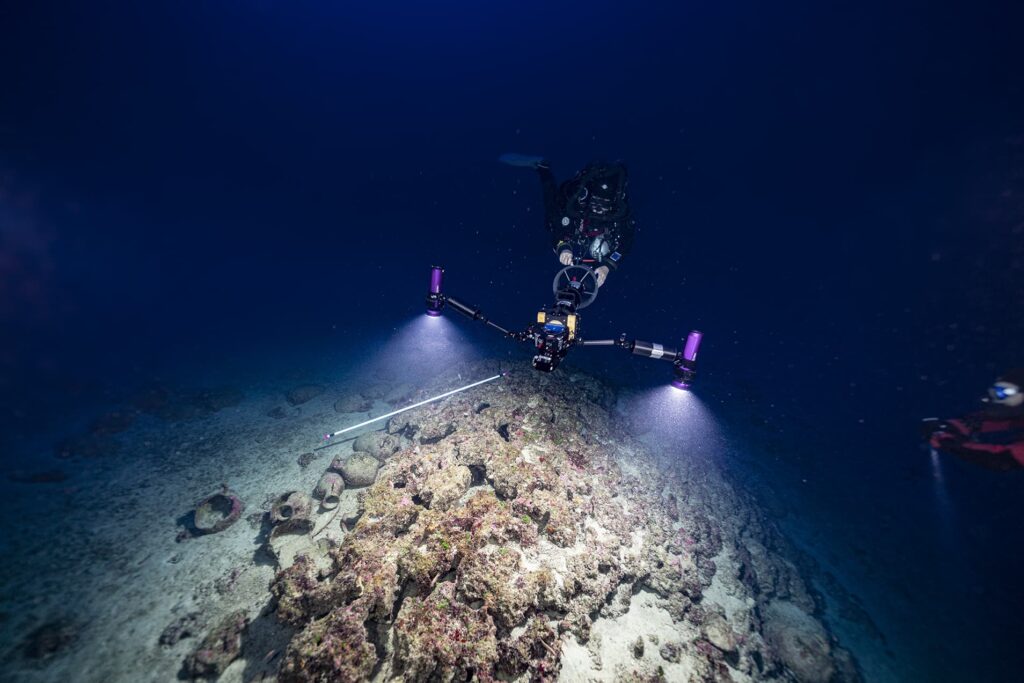 Diver capturing the site in 3D using a camera mounted on an underwater scooter.